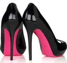 Black high heels with pink sole