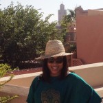 Kiesha Meikle in Marrakech with a straw hat