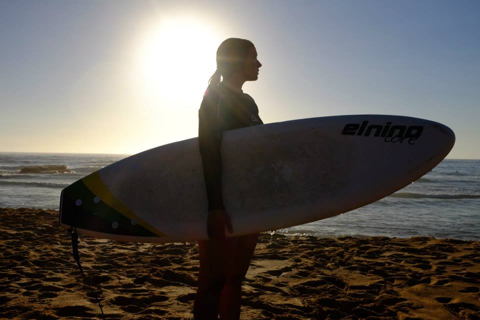 Lauren Metzler with surf board