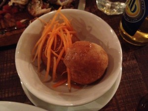 Fried dumplings in carrot and plum sauce