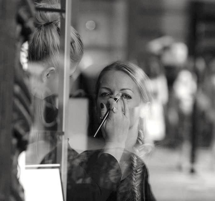 Make up being done on a woman