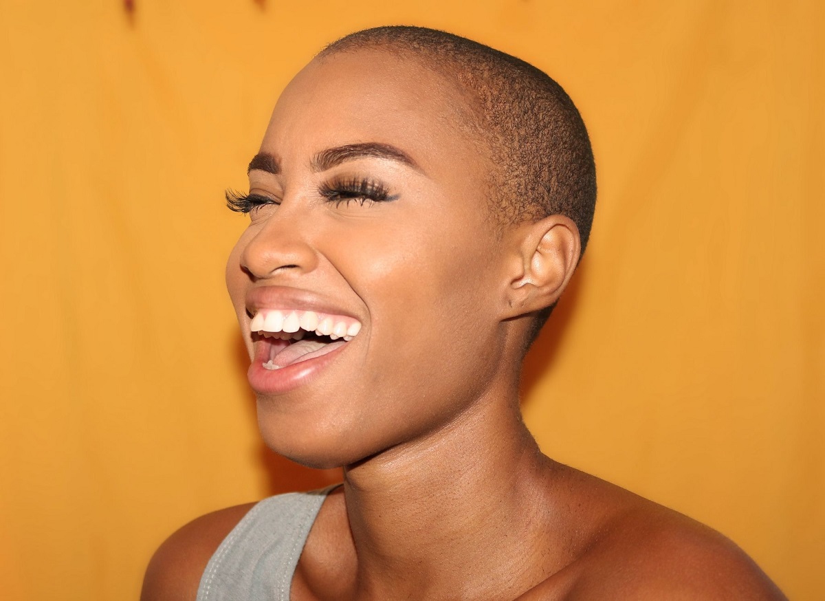 Smiling bald headed woman
