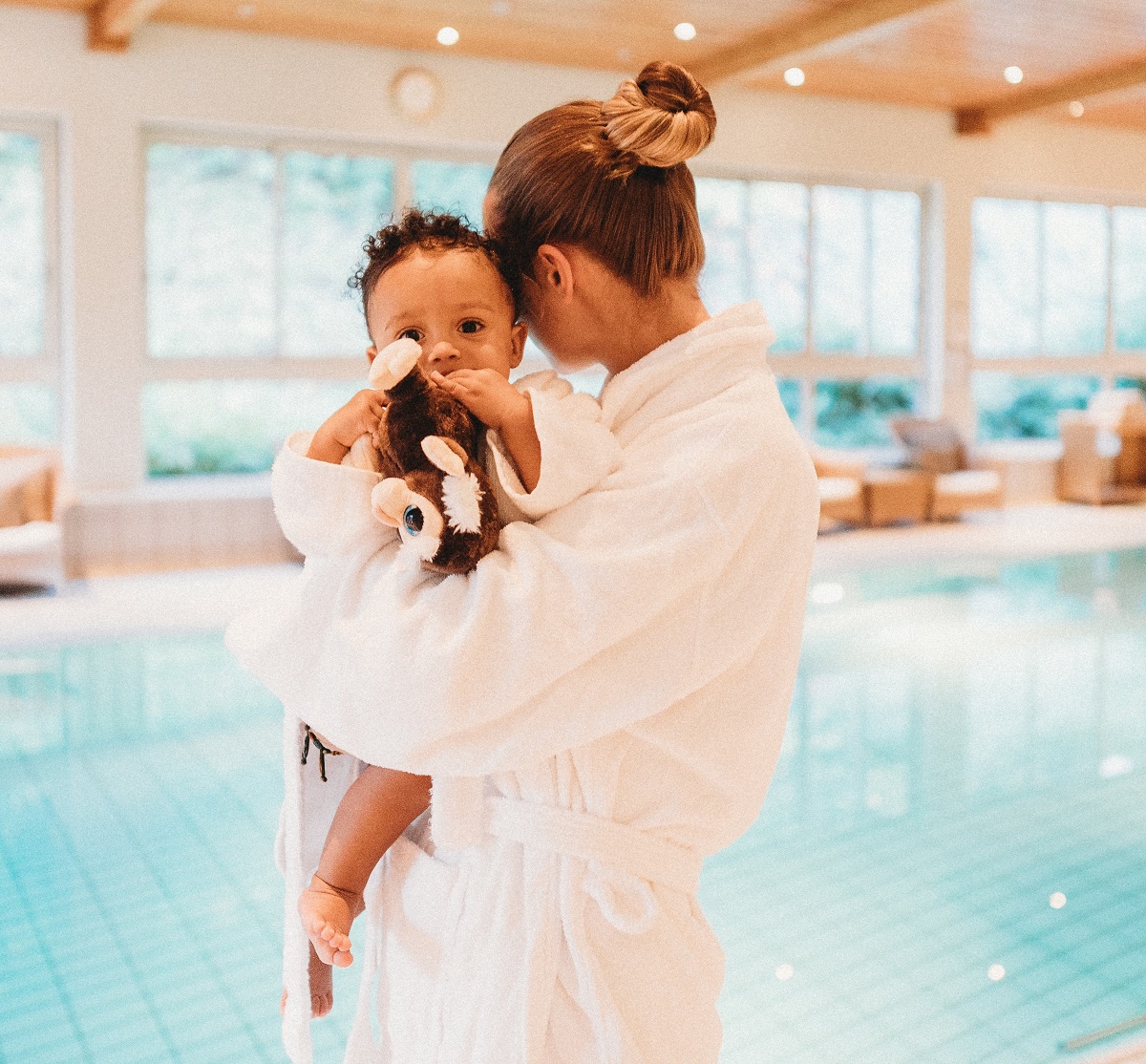 Woman in spa with baby