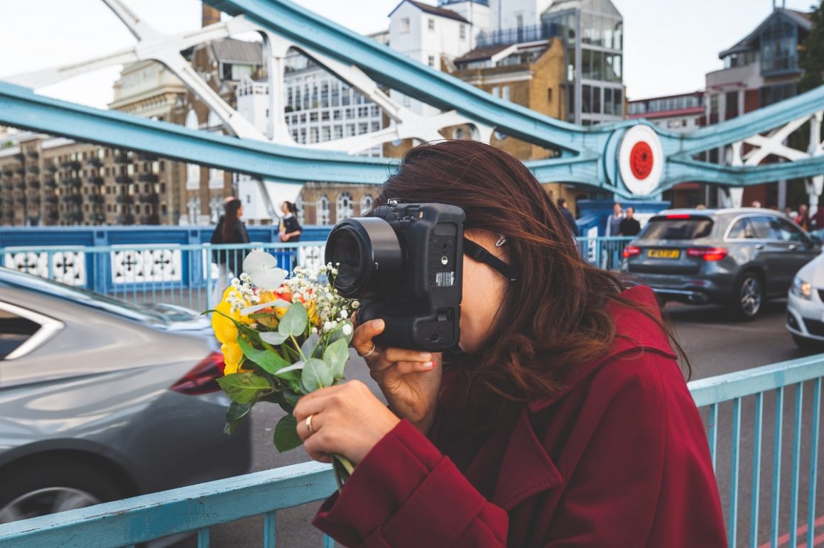 Woman with flowers on Tower Bridge
