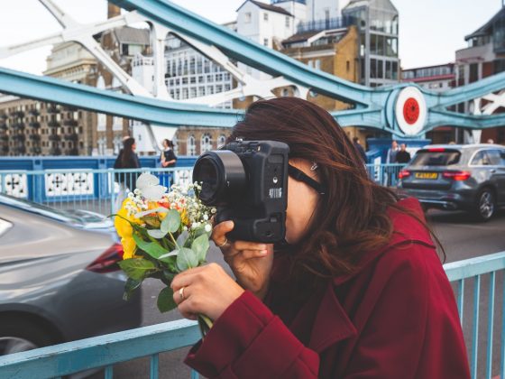 Woman with flowers on Tower Bridge