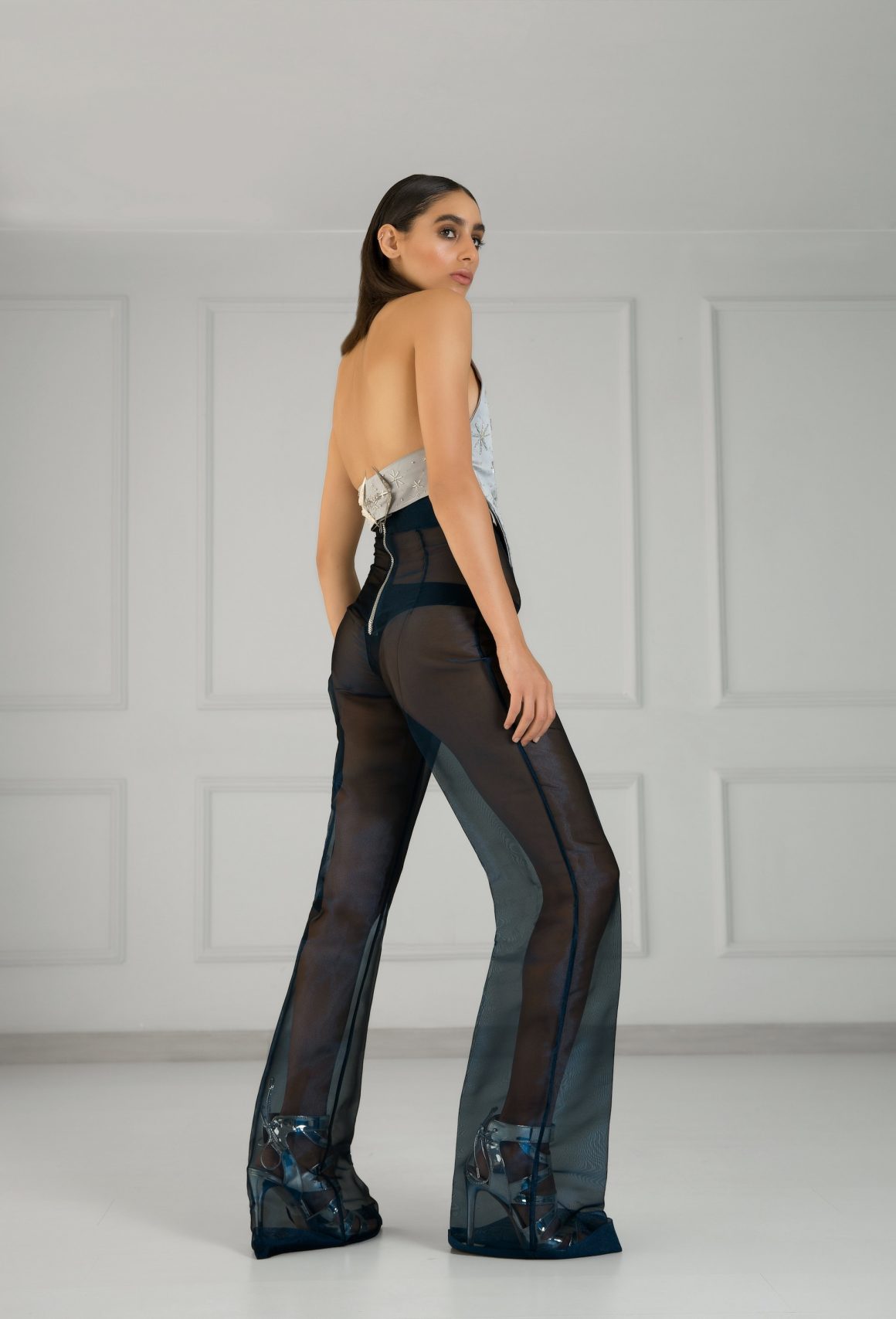 Fashion over 40: model wears sheer trousers and a thong